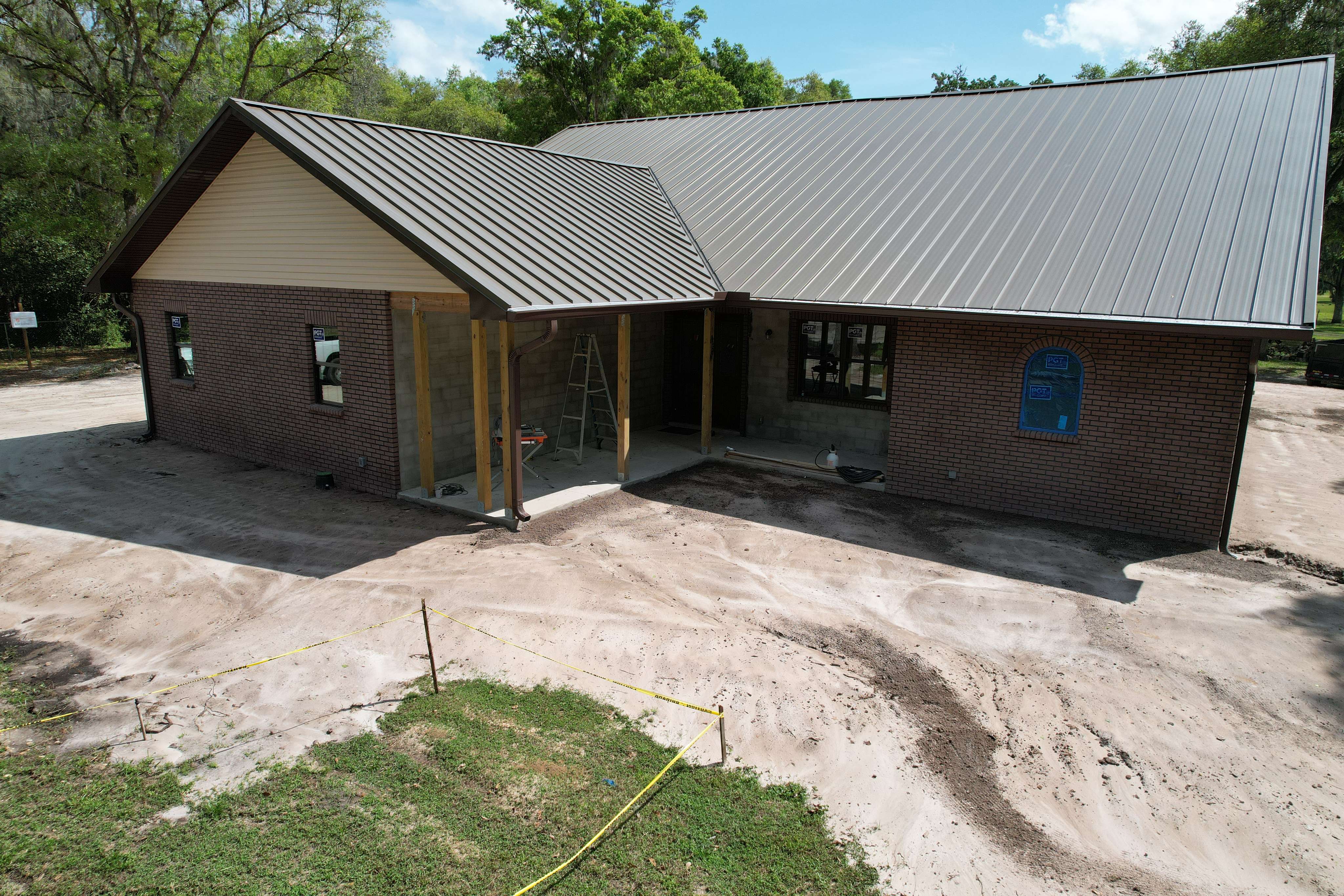 A house with a metal roof and a metal roof