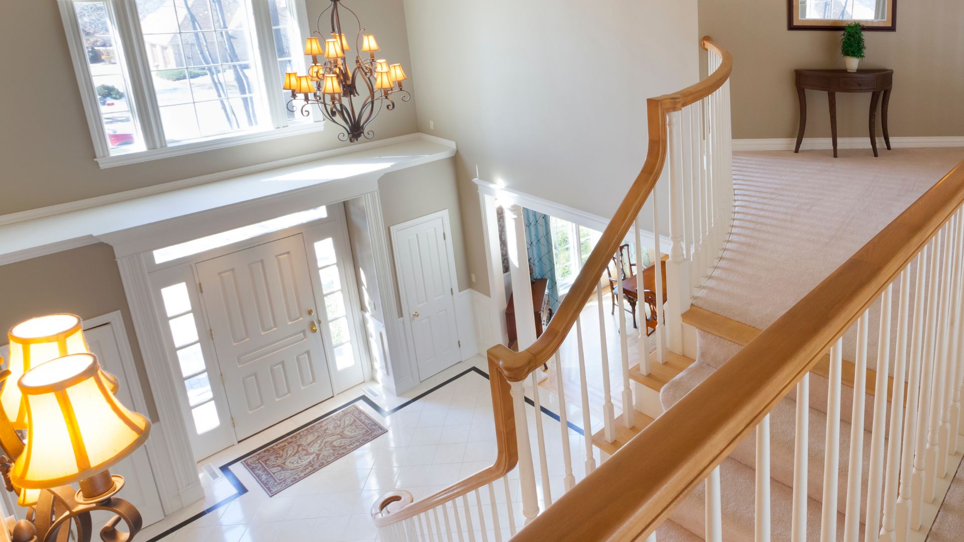 A view of a staircase from the second floor of a house