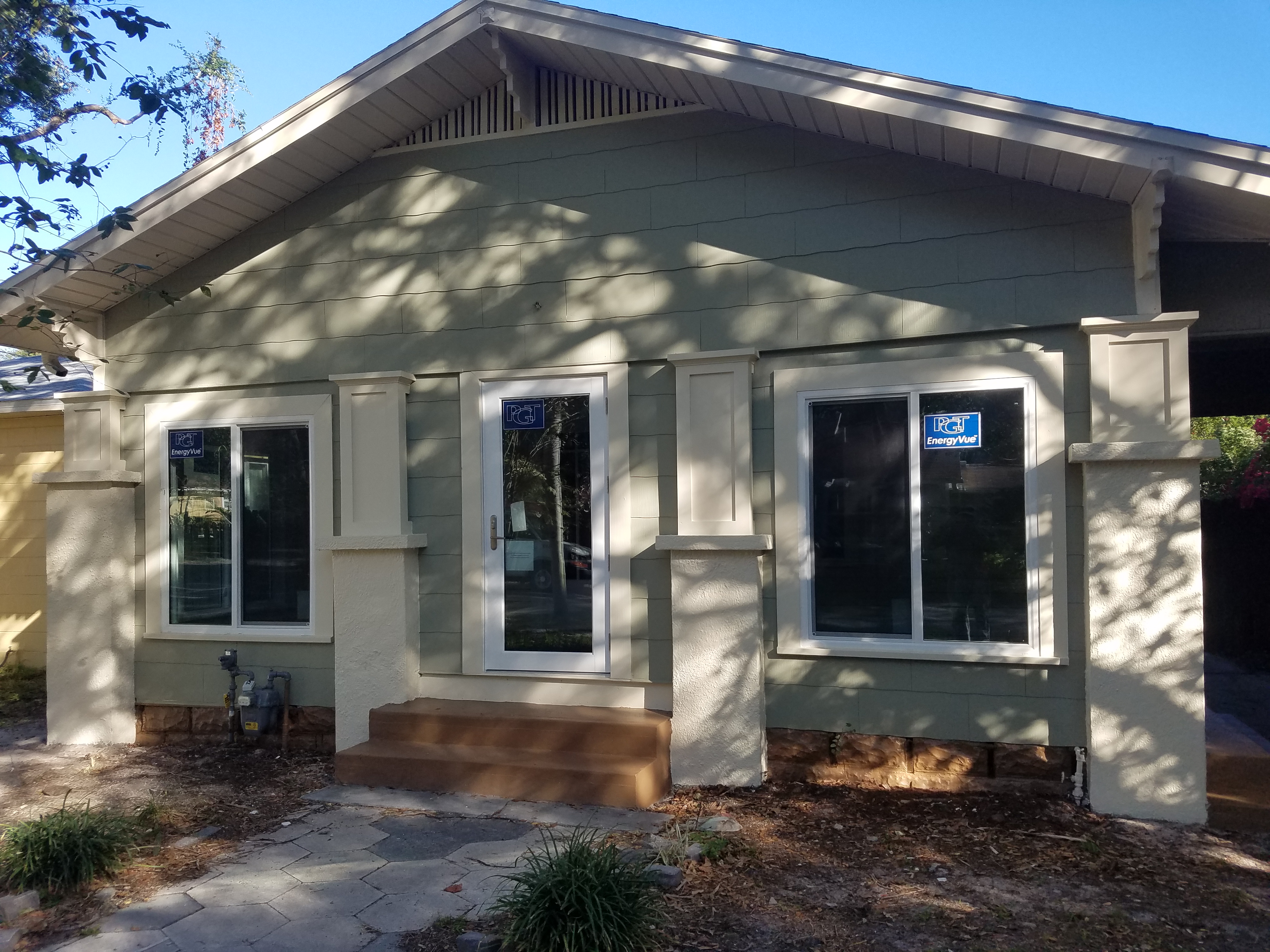 A house with a sign on the front of it